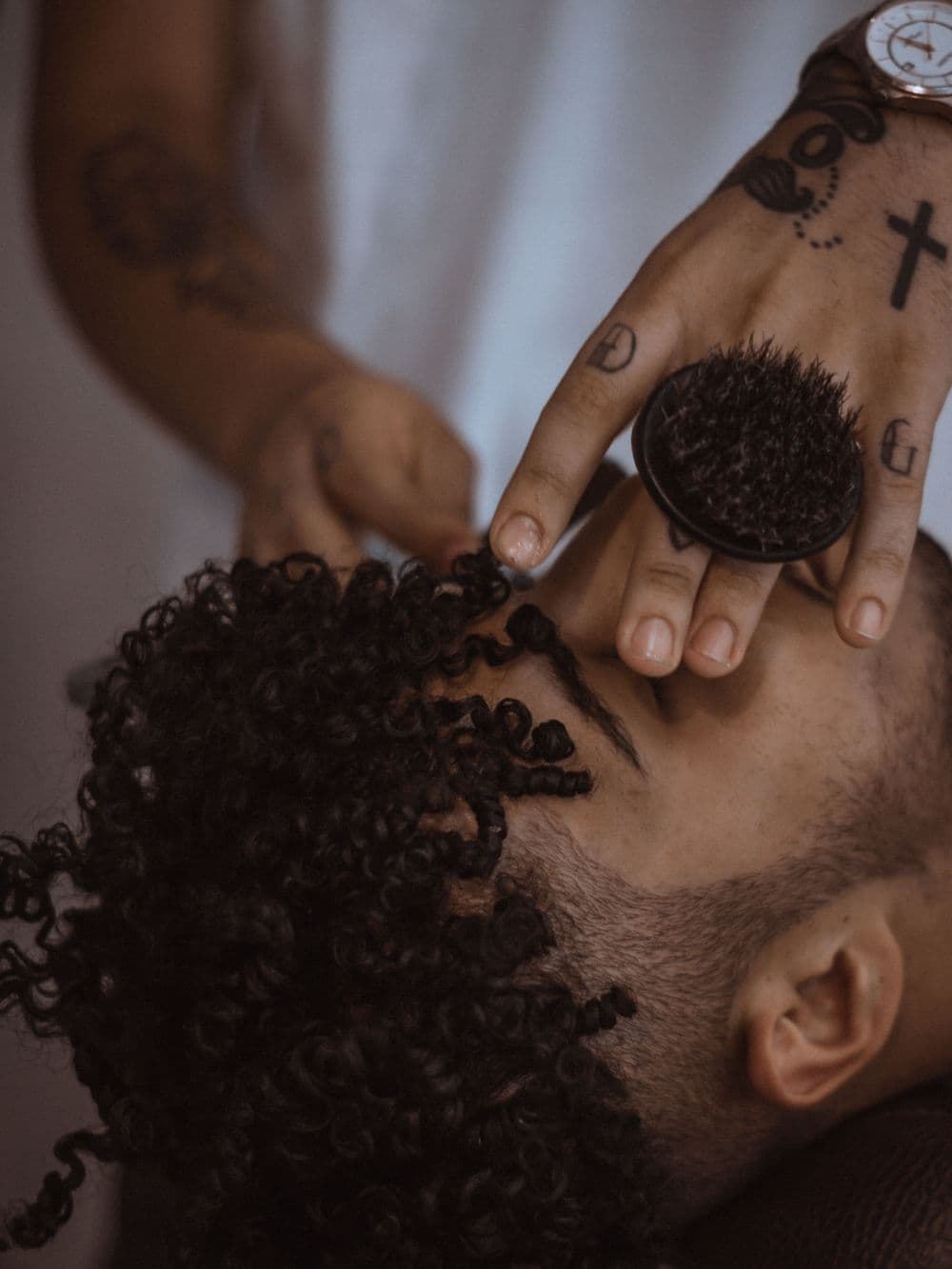 Brush work through a finished curly cut